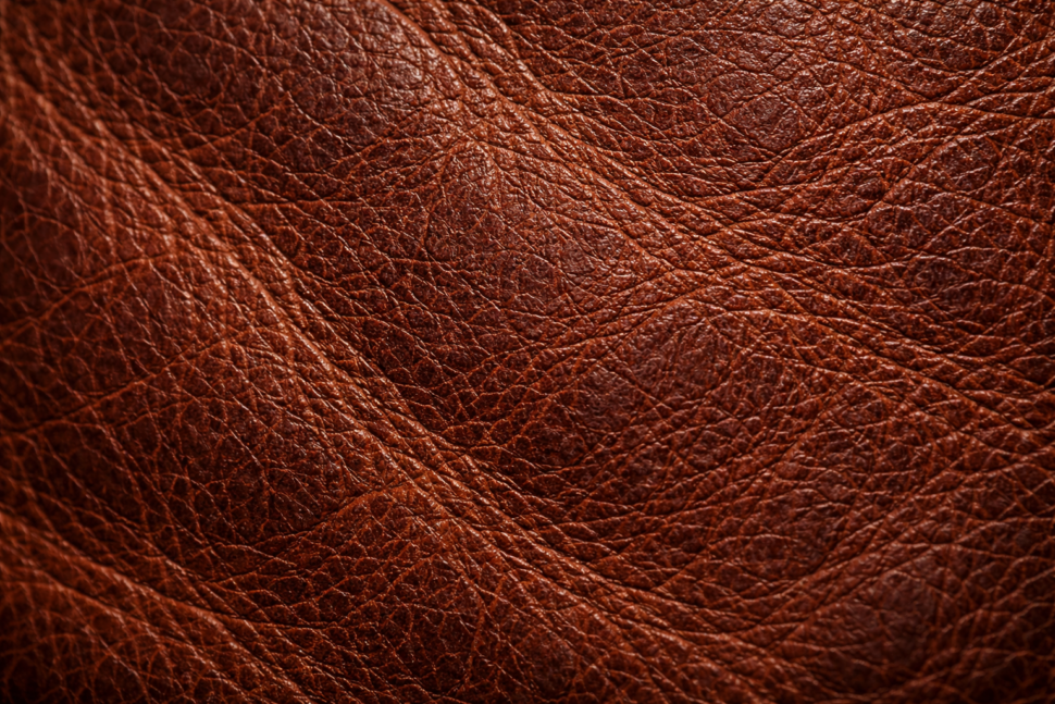 full grain leather quality close up showing premium texture used by custom leather jacket manufacturers